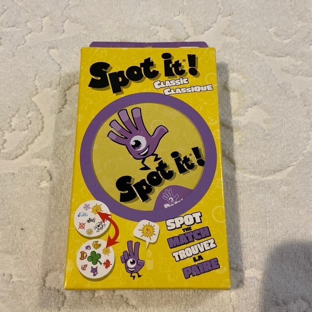 SPOT IT classic card game. New​​​​​​​​